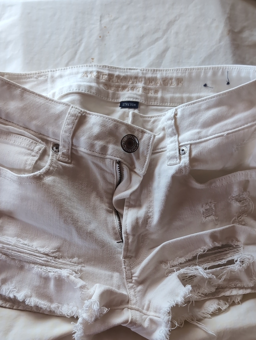 American Eagle Outfitters White Distressed Denim Shorts